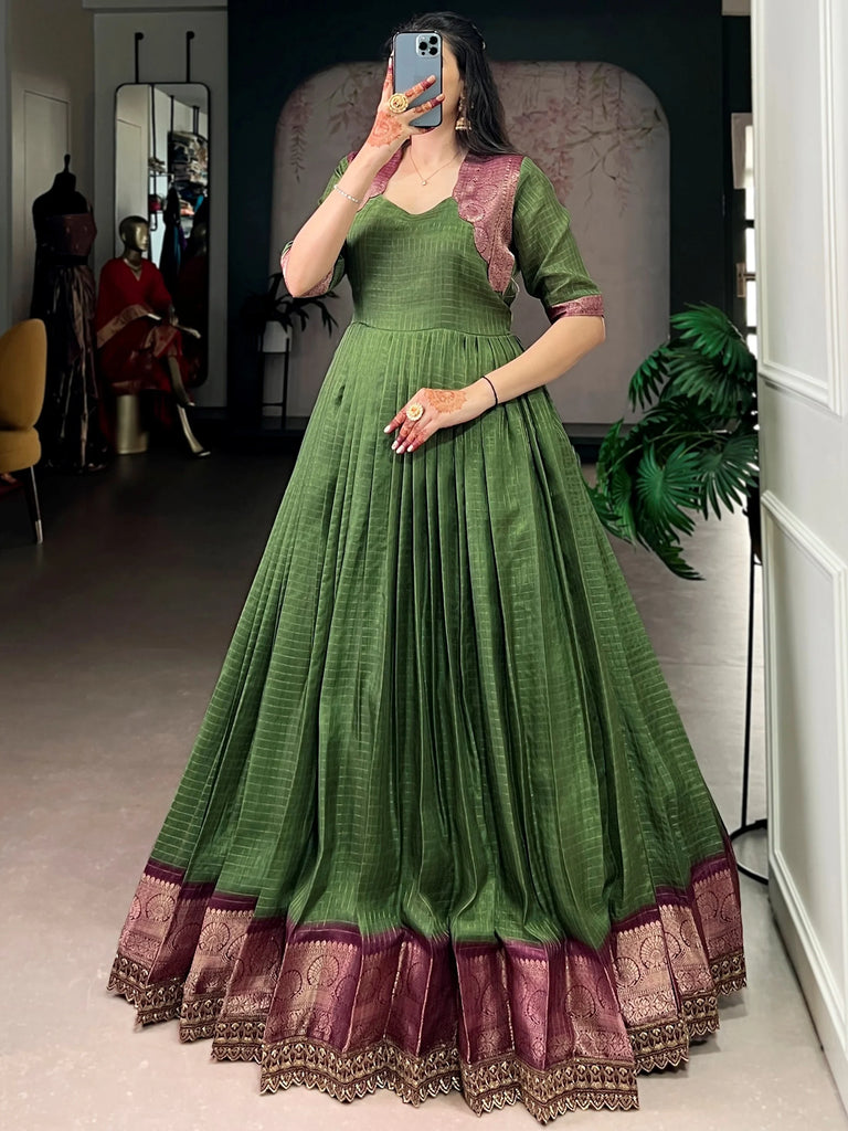 Wonderful Green Zari Weaving Silk Festival Wear Gown