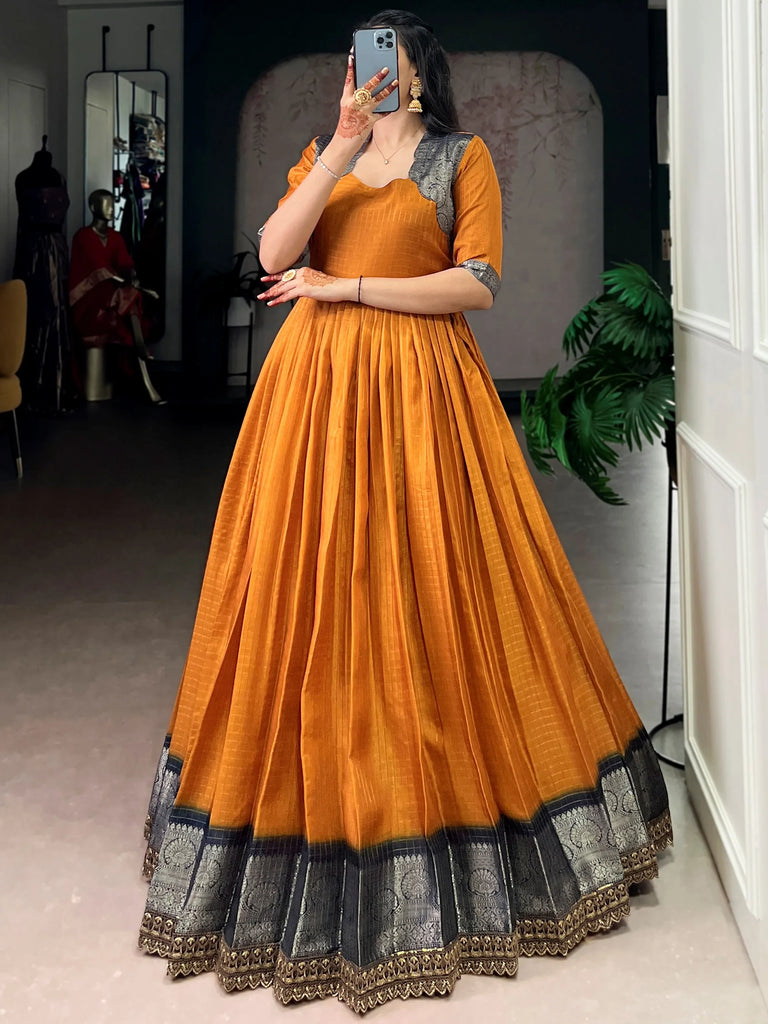 Incredible Mustard Yellow Zari Weaving Silk Function Wear Gown