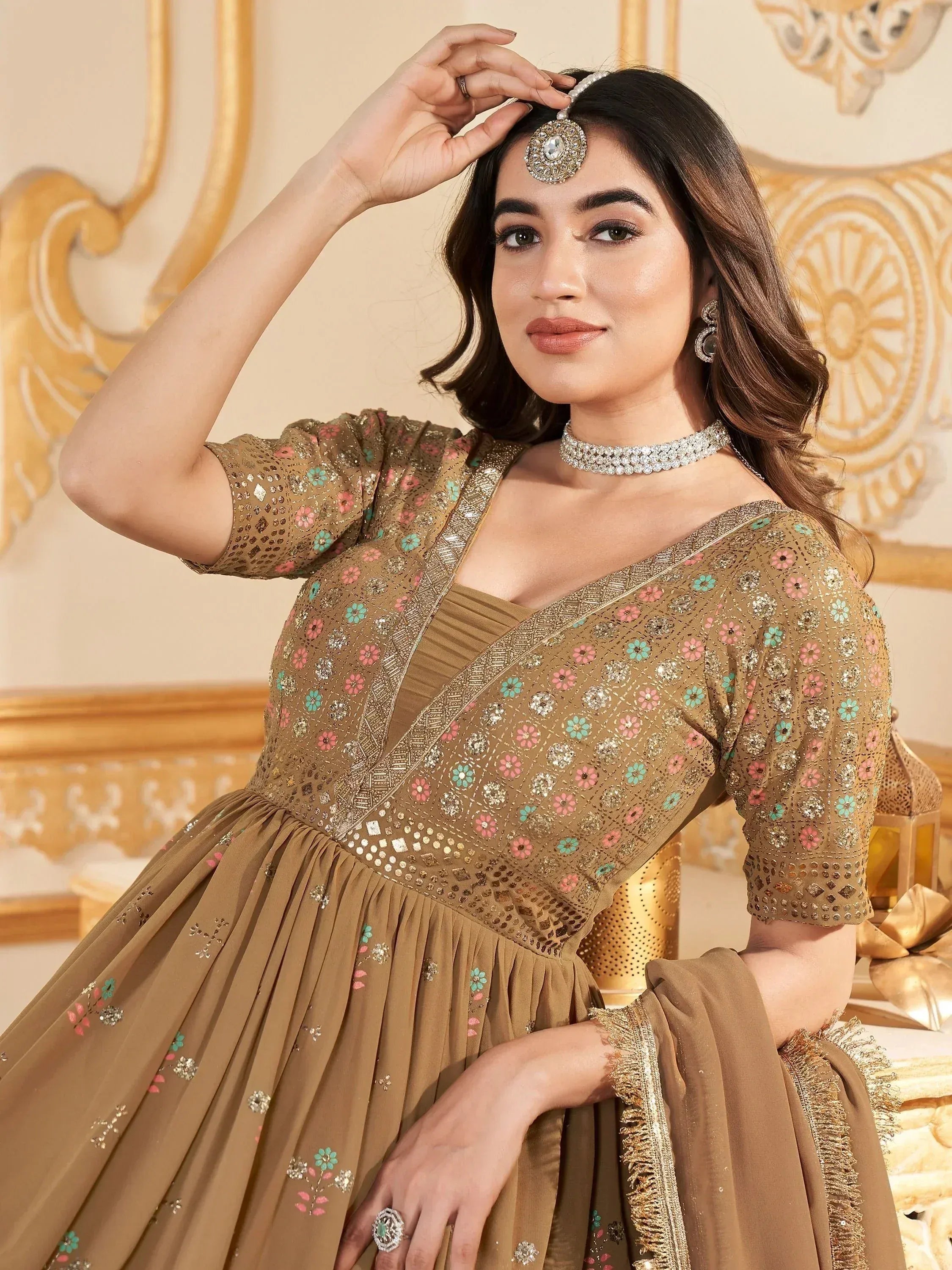Elegant Indian ethnic gown with floral embroidery, perfect for weddings and festive occasions.