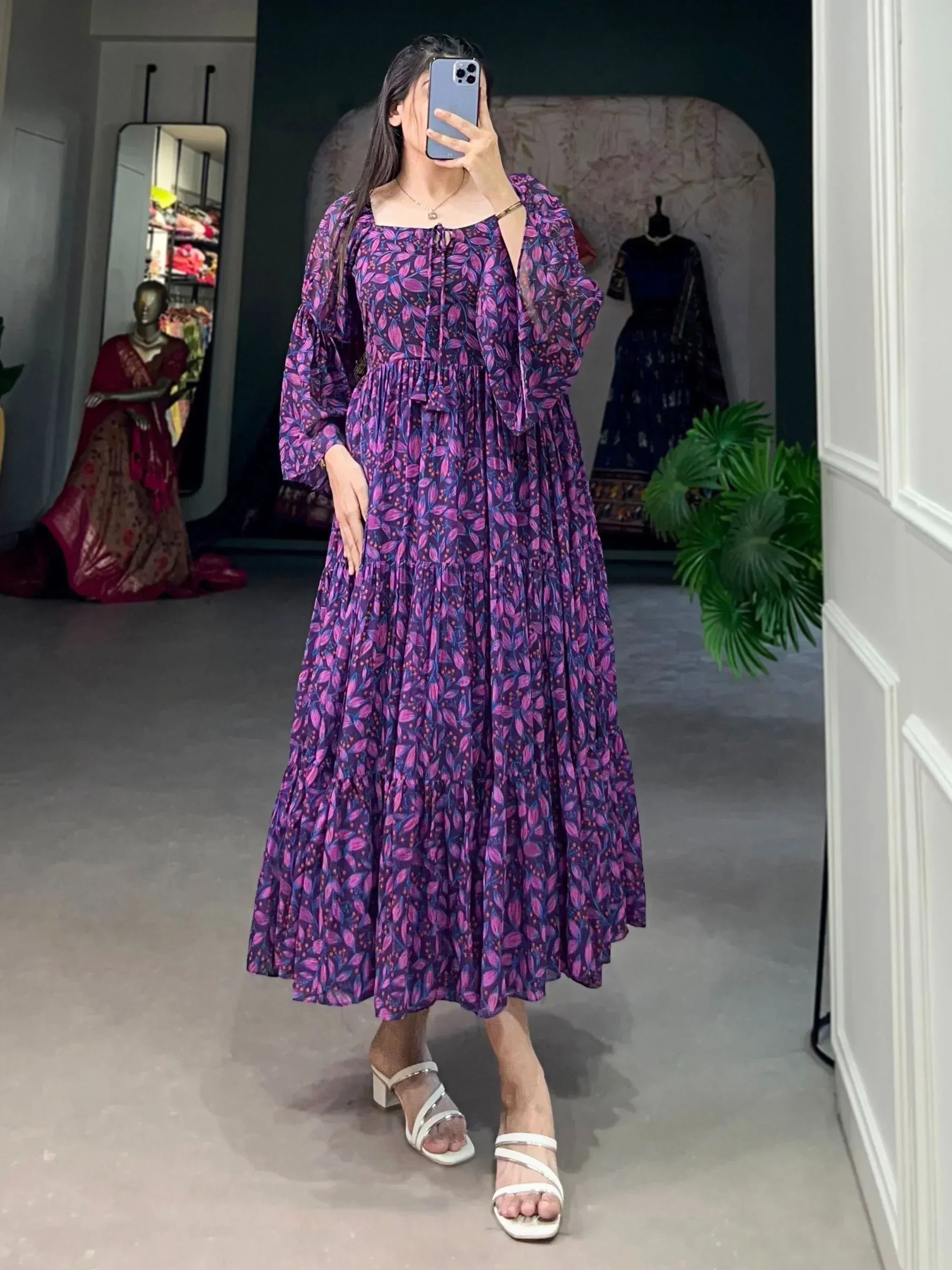 Purple floral ethnic gown with puff sleeves, perfect for Indian occasions and festive wear.