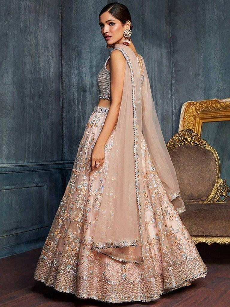 Charming Peach Sequins Net Engagement Wear Lehenga Choli With Dupatta