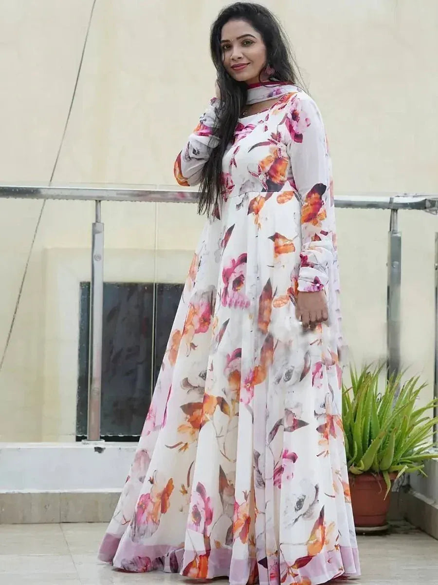 Woman in floral print ethnic gown with long sleeves, perfect for Indian occasions and festive wear