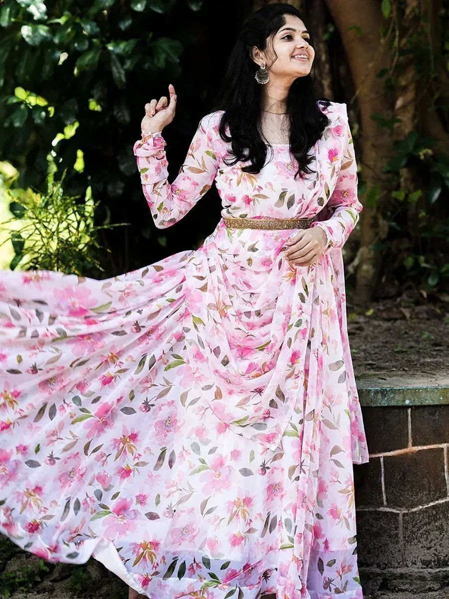 Pink floral ethnic gown with long sleeves and gold belt, perfect for Indian occasions