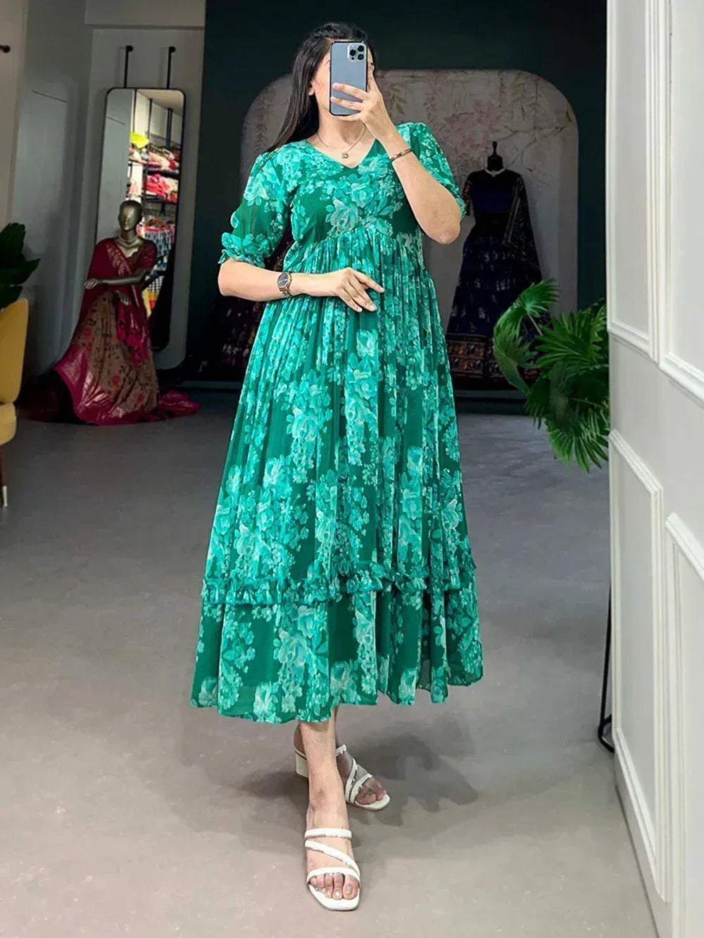 Green floral print ethnic gown with tiered skirt, perfect for Indian occasions and festive wear