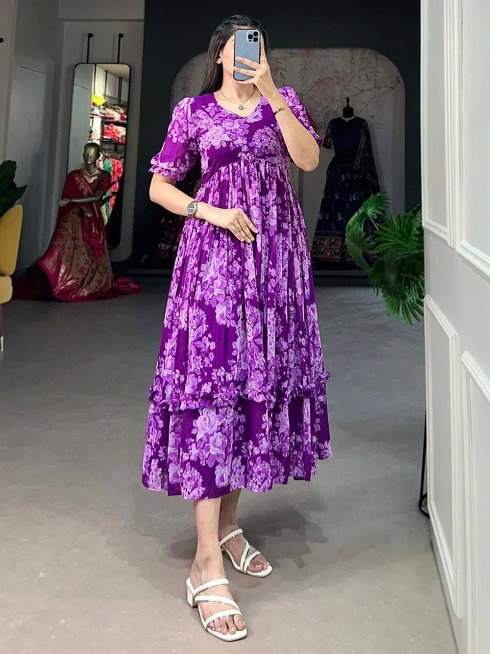 Purple floral ethnic gown with ruffled layers, perfect for Indian occasions and festive wear.