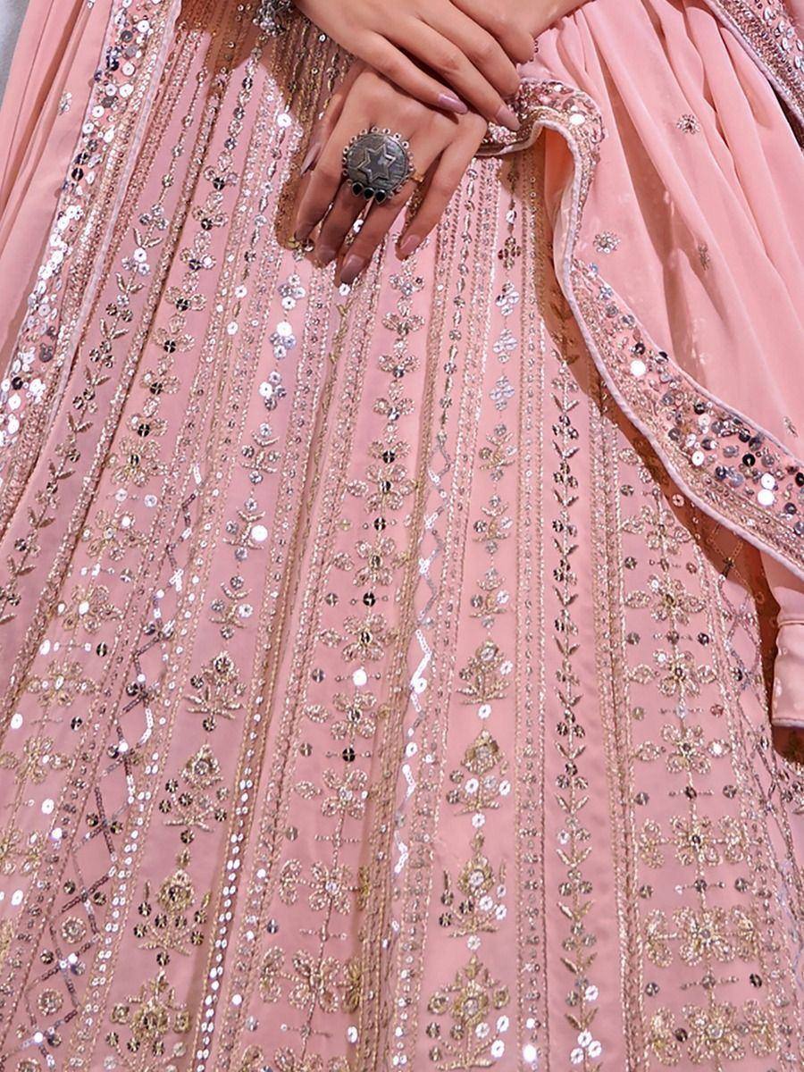 Pink designer lehenga with gold embroidery and sequin detailing, perfect for Indian ethnic wear