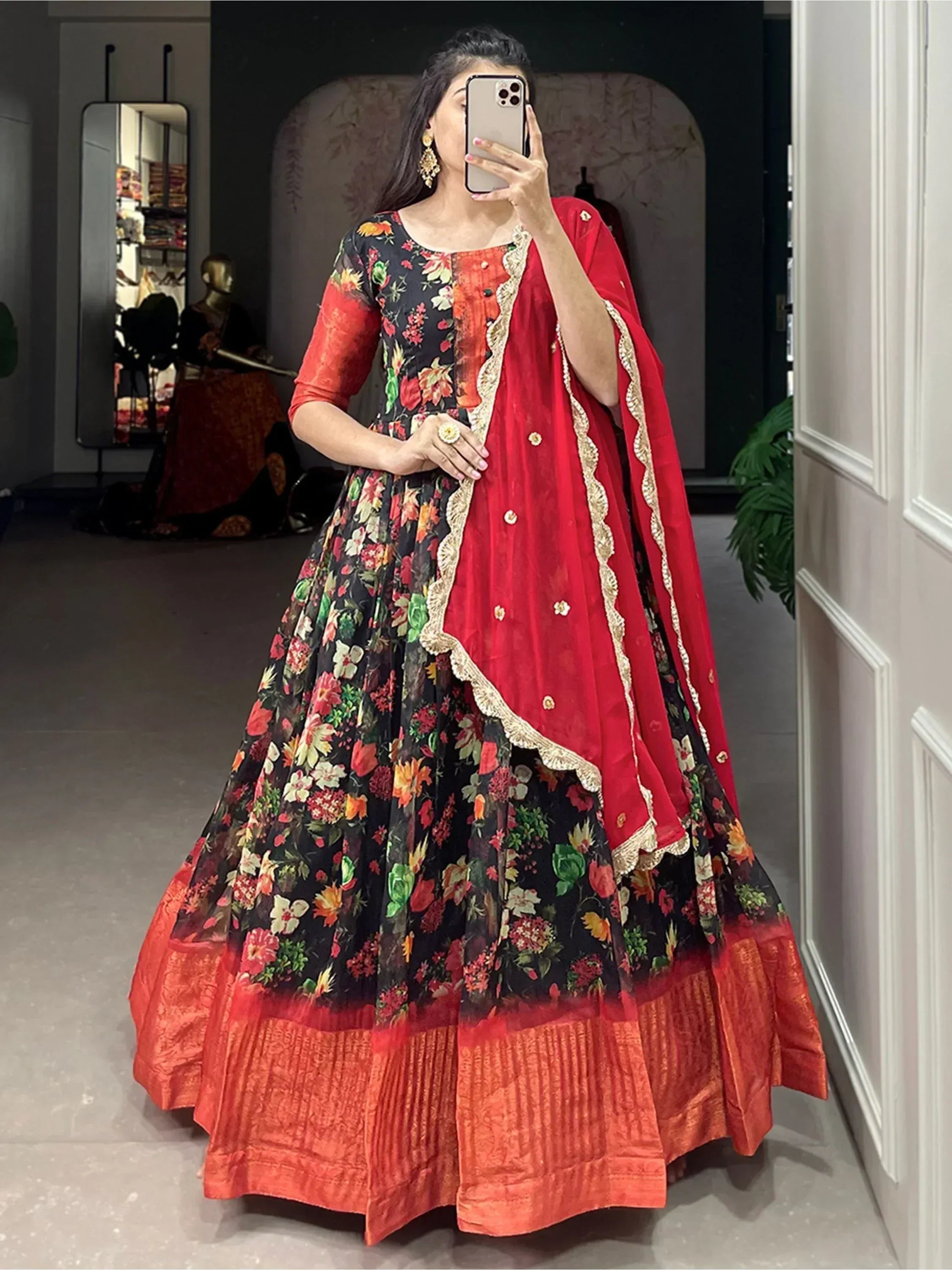 Black floral print lehenga with red dupatta and orange border, Indian ethnic wear