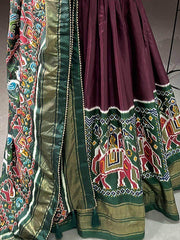 Stupendous Brown Patola Print Dola Silk Party Wear Gown