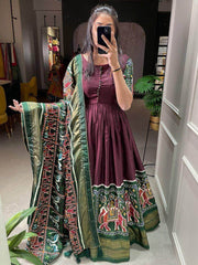 Stupendous Brown Patola Print Dola Silk Party Wear Gown
