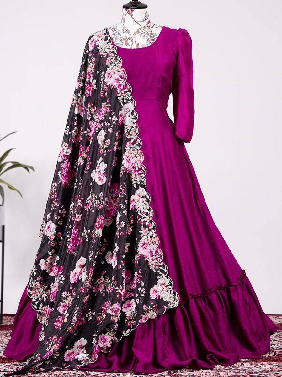 Magenta ethnic gown with black floral dupatta, perfect for Indian weddings and festive occasions