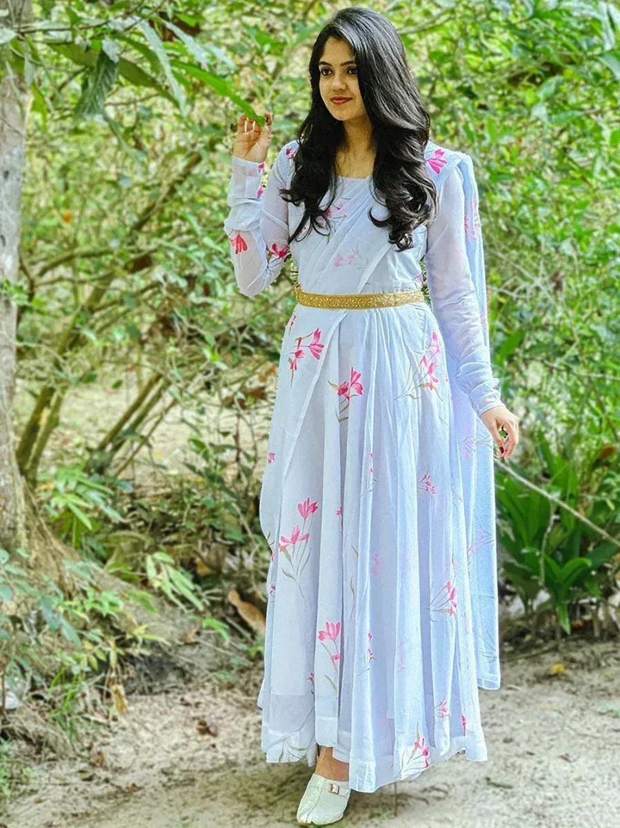 Light blue floral ethnic gown with gold belt, perfect for Indian occasions and festive wear.