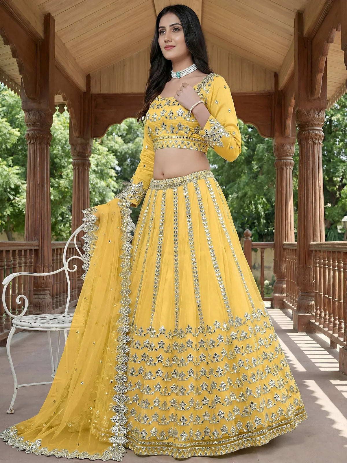 Captivating Yellow Foil Work Net Sangeet Wear Lehenga Choli