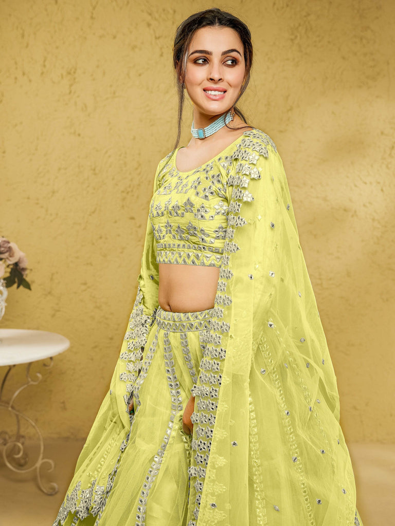 Captivating Lime Yellow Foil Work Net Engagement Wear Lehenga Choli