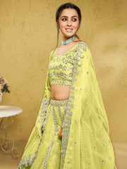 Captivating Lime Yellow Foil Work Net Engagement Wear Lehenga Choli
