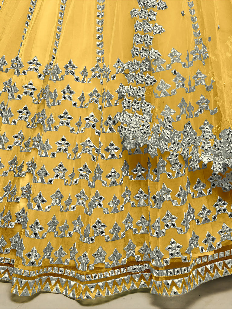 Magnetic Yellow Foil Work Net Haldi Wear Lehenga Choli With Dupatta