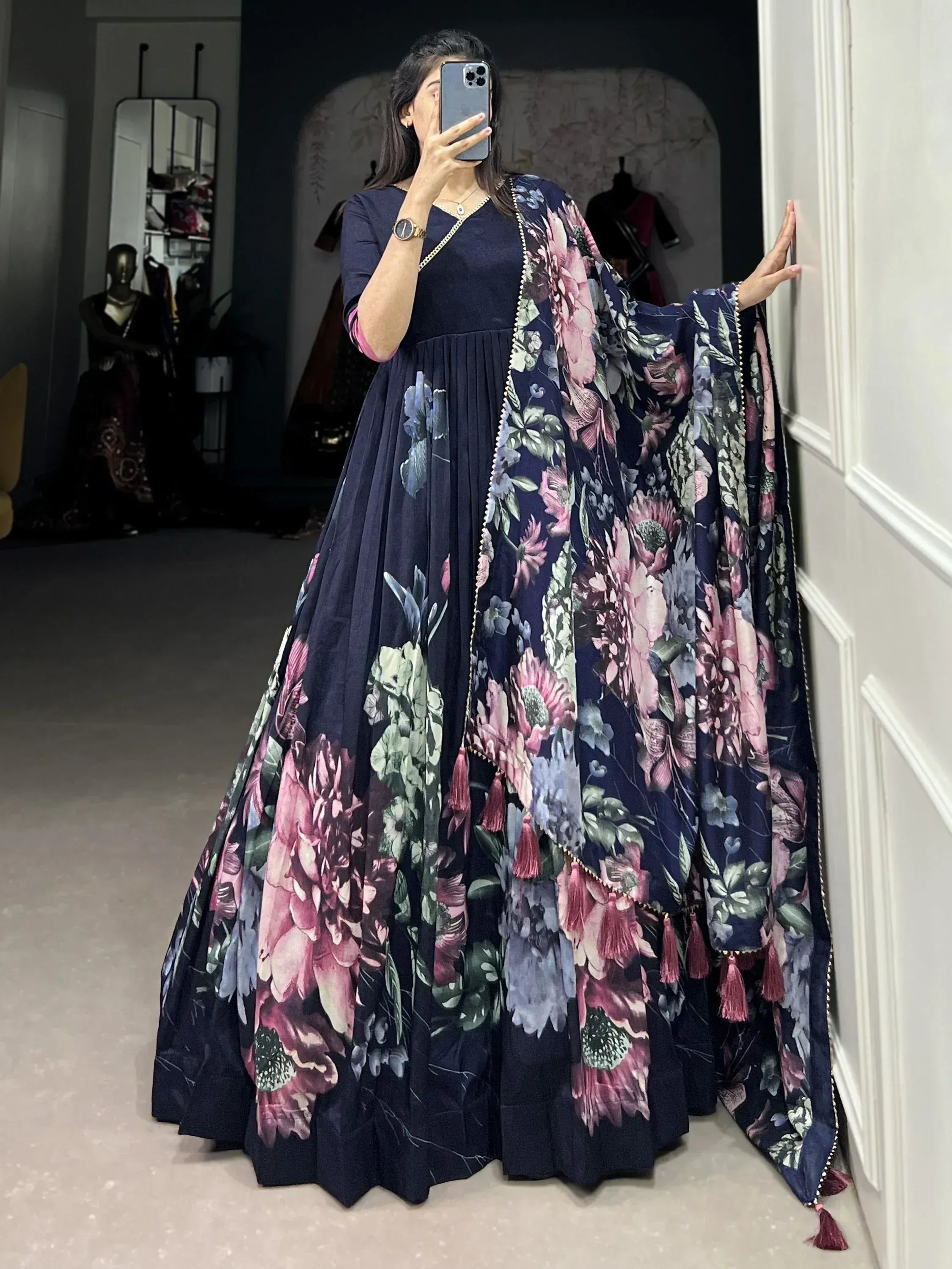 Navy blue floral print ethnic gown with matching dupatta, perfect for Indian occasions and parties.