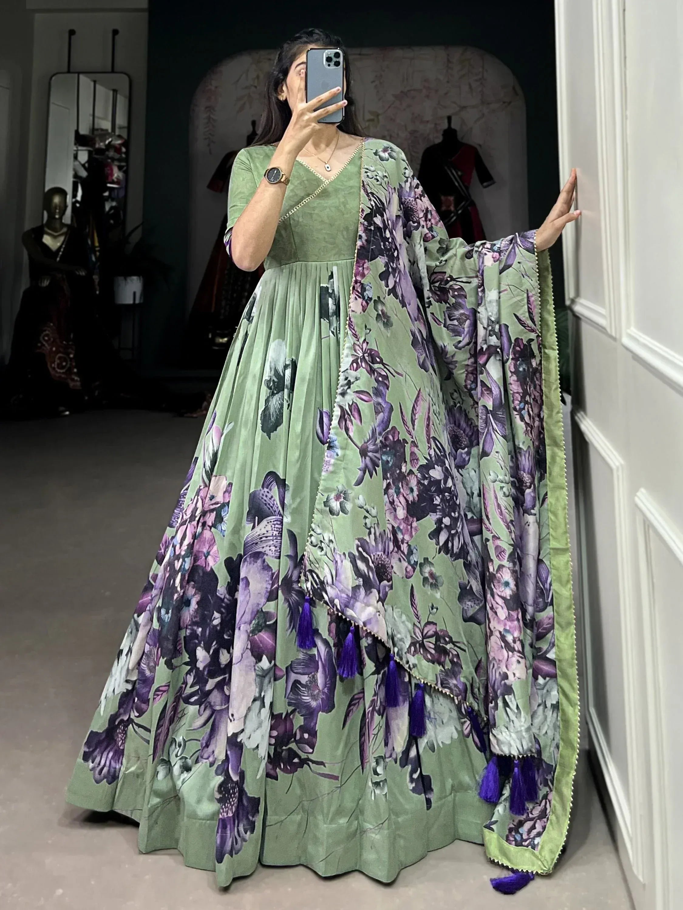 Green floral anarkali gown with purple tassels, perfect for Indian ethnic wear occasions