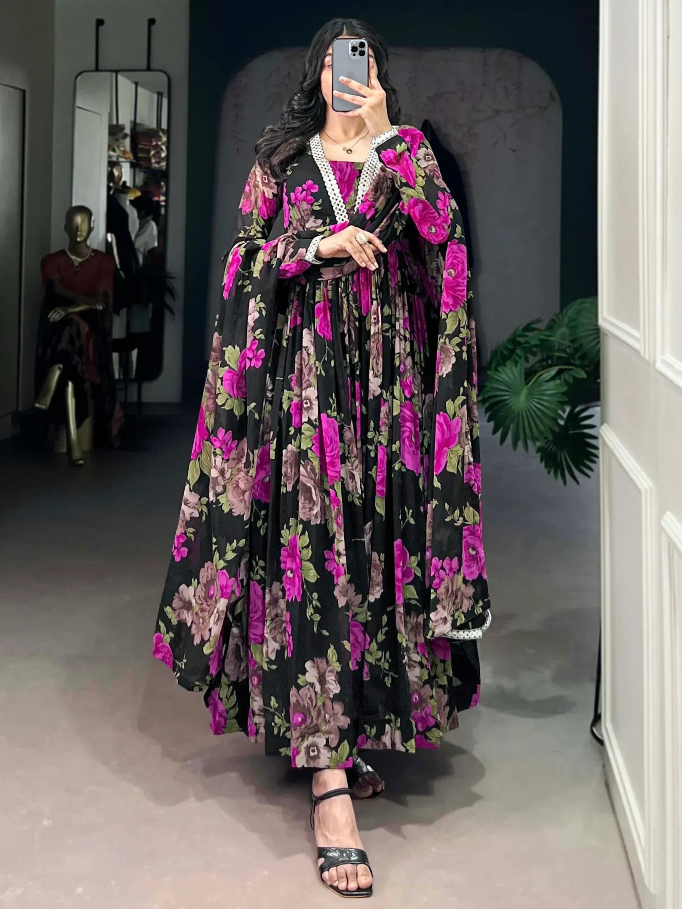 Black floral ethnic gown with pink roses, white lace trim, perfect for Indian occasions and parties