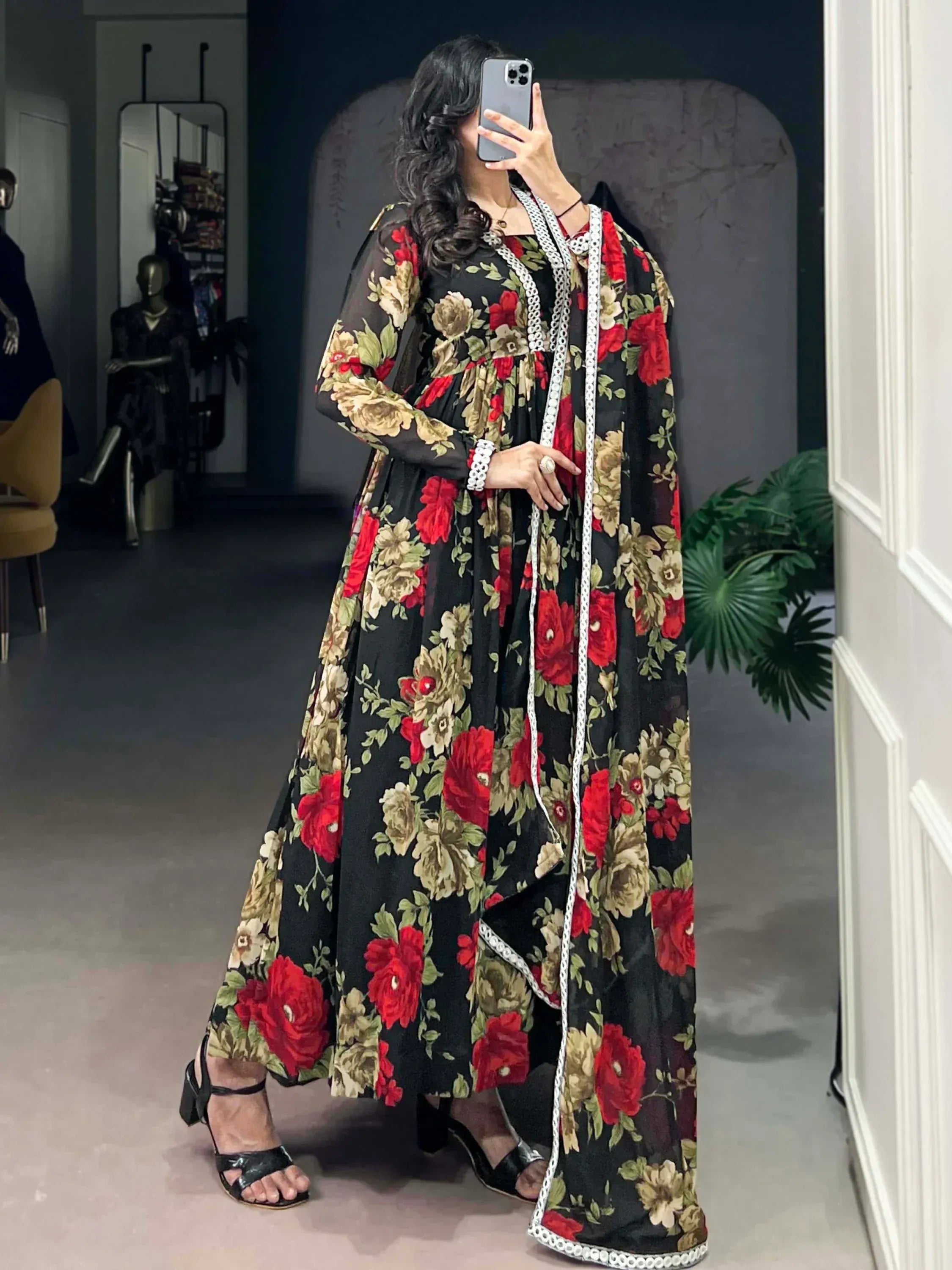 Black floral ethnic gown with red and gold roses, white lace trim, perfect for Indian occasions