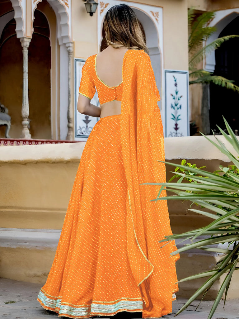 Pretty Orange Laheriya Print Georgette Wedding Lehenga Choli