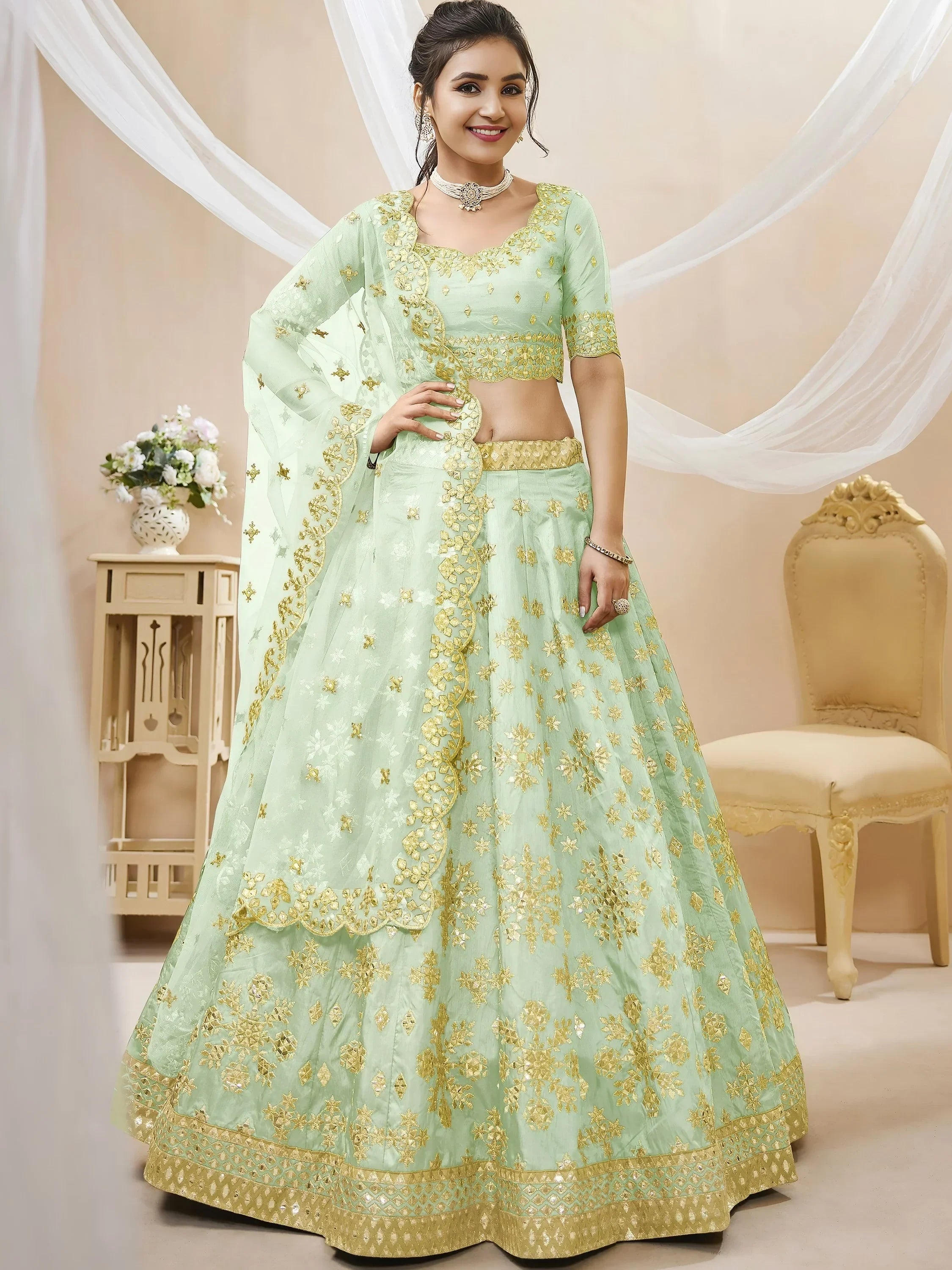 Mesmerizing Pista Embroidered Art Silk Reception Wear Lehenga Choli