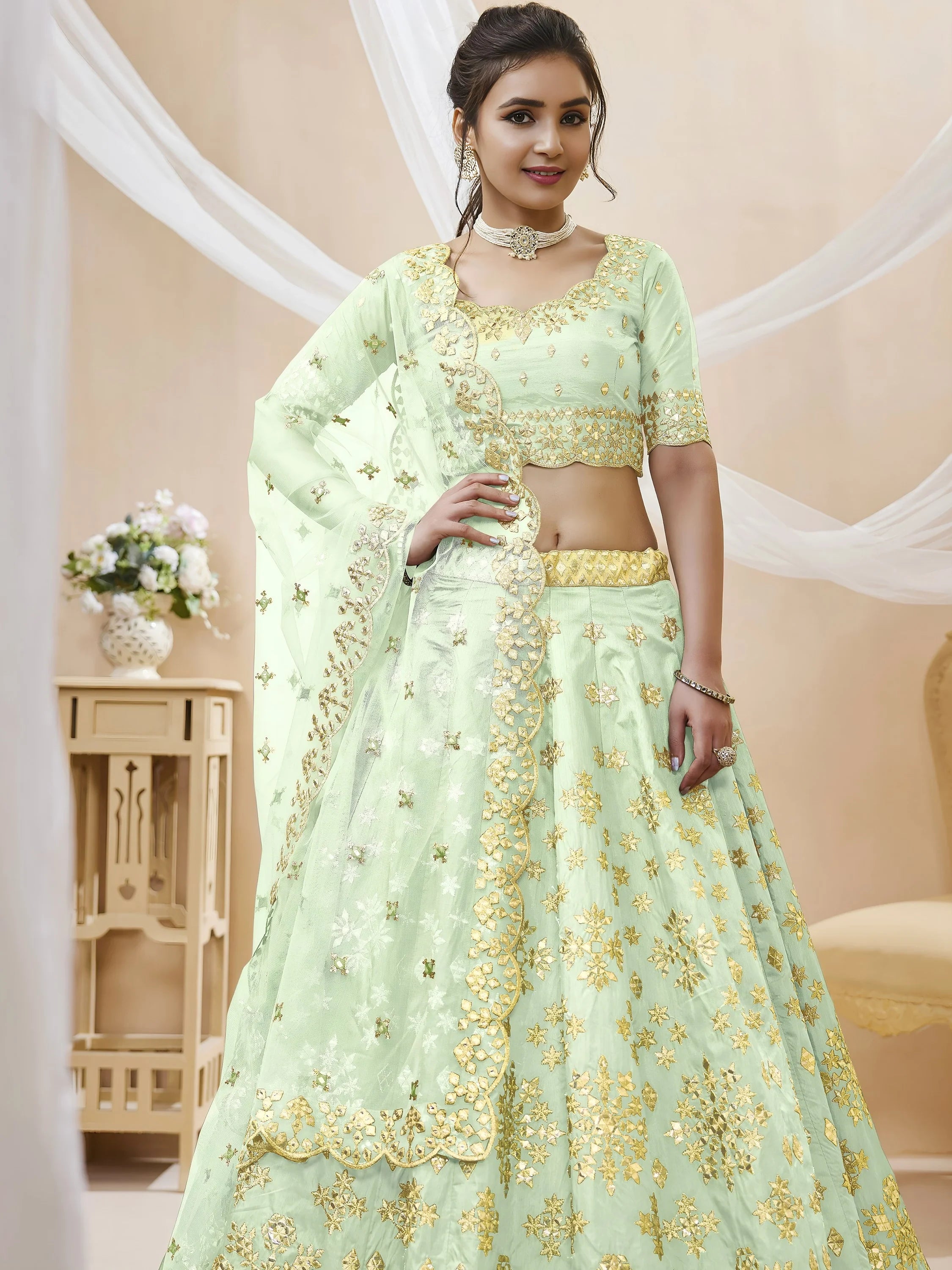 Mesmerizing Pista Embroidered Art Silk Reception Wear Lehenga Choli