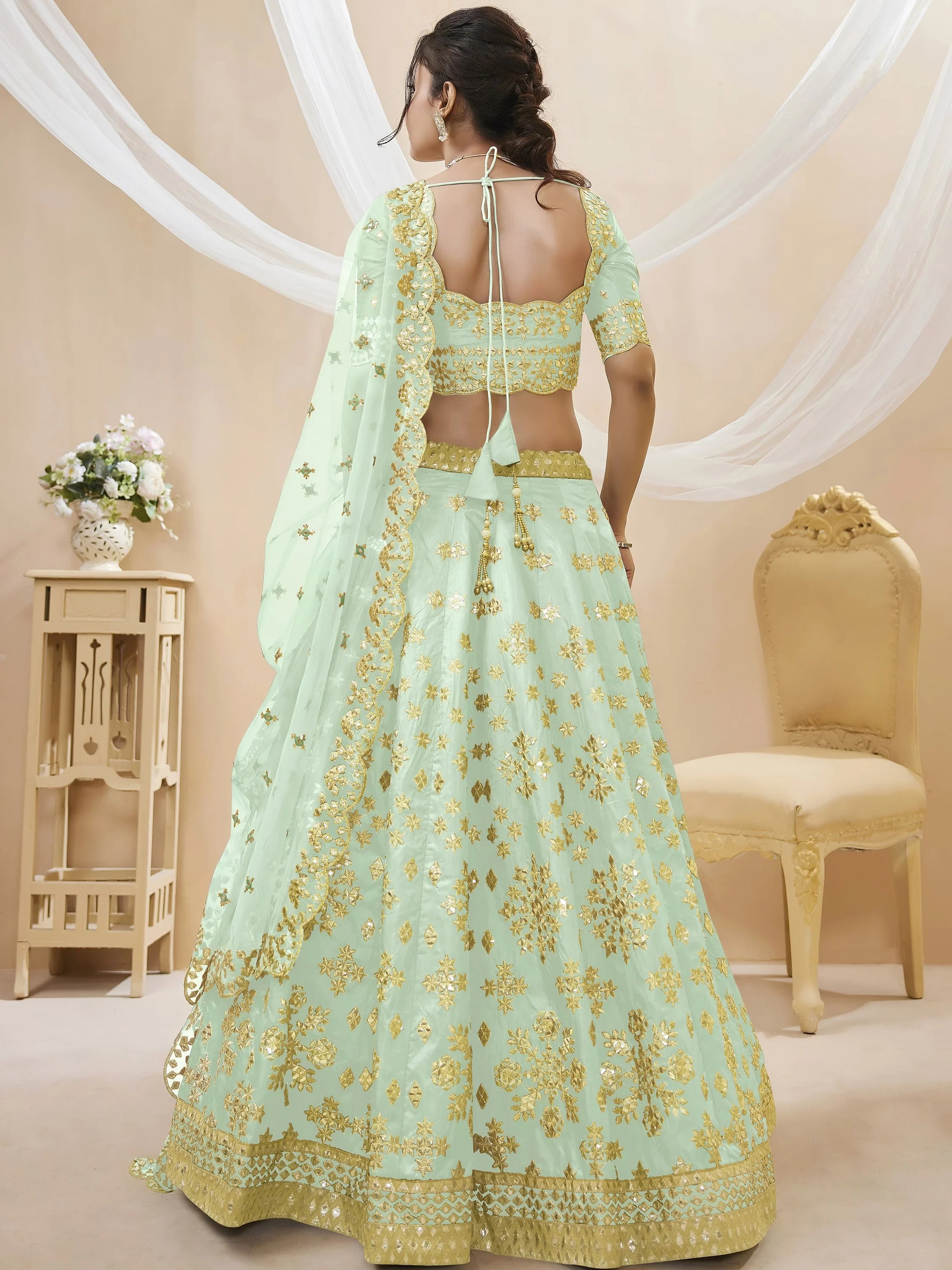 Mesmerizing Pista Embroidered Art Silk Reception Wear Lehenga Choli