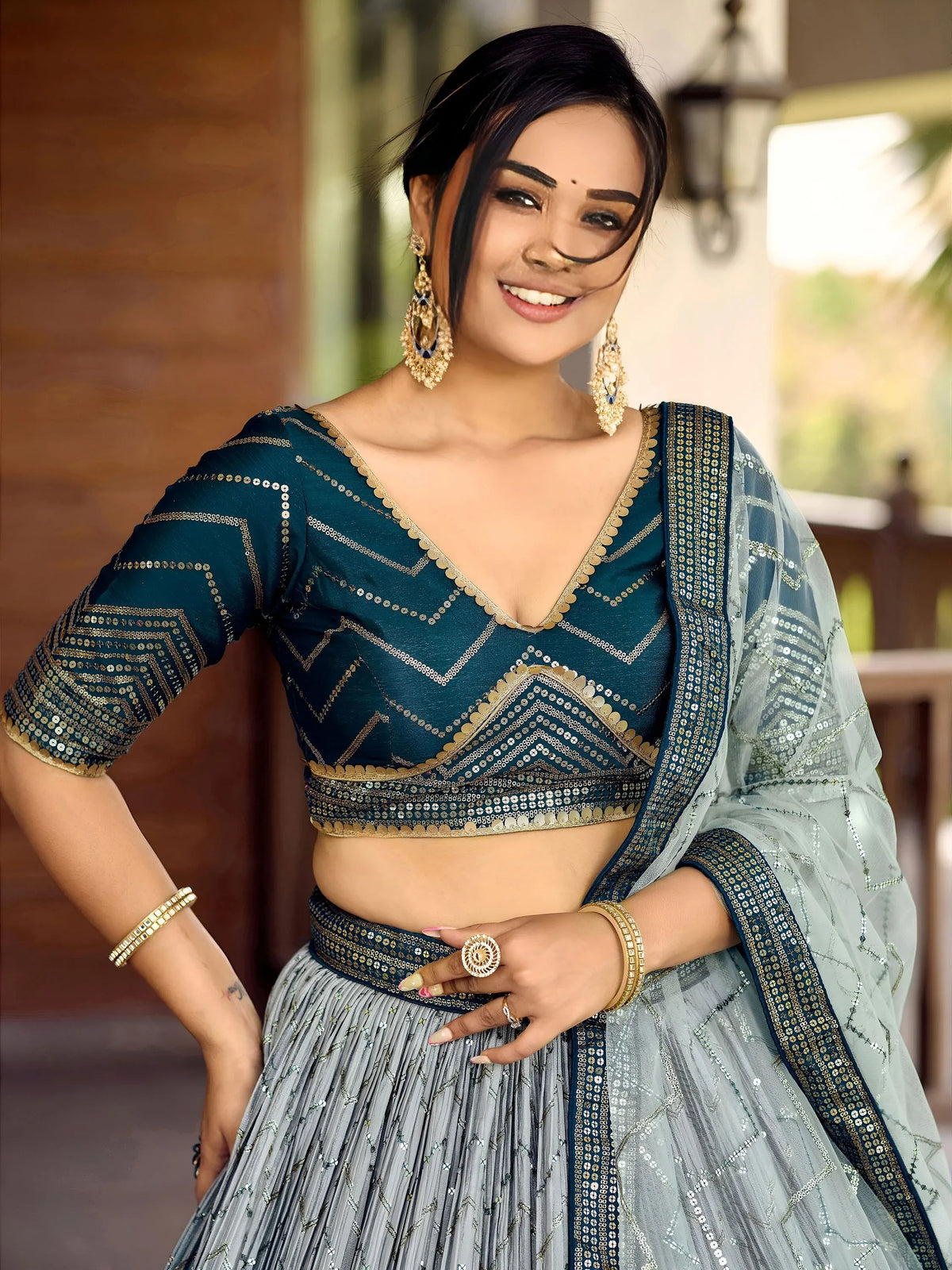 Wonderful Blue Sequins Chinon Function Wear Lehenga Choli
