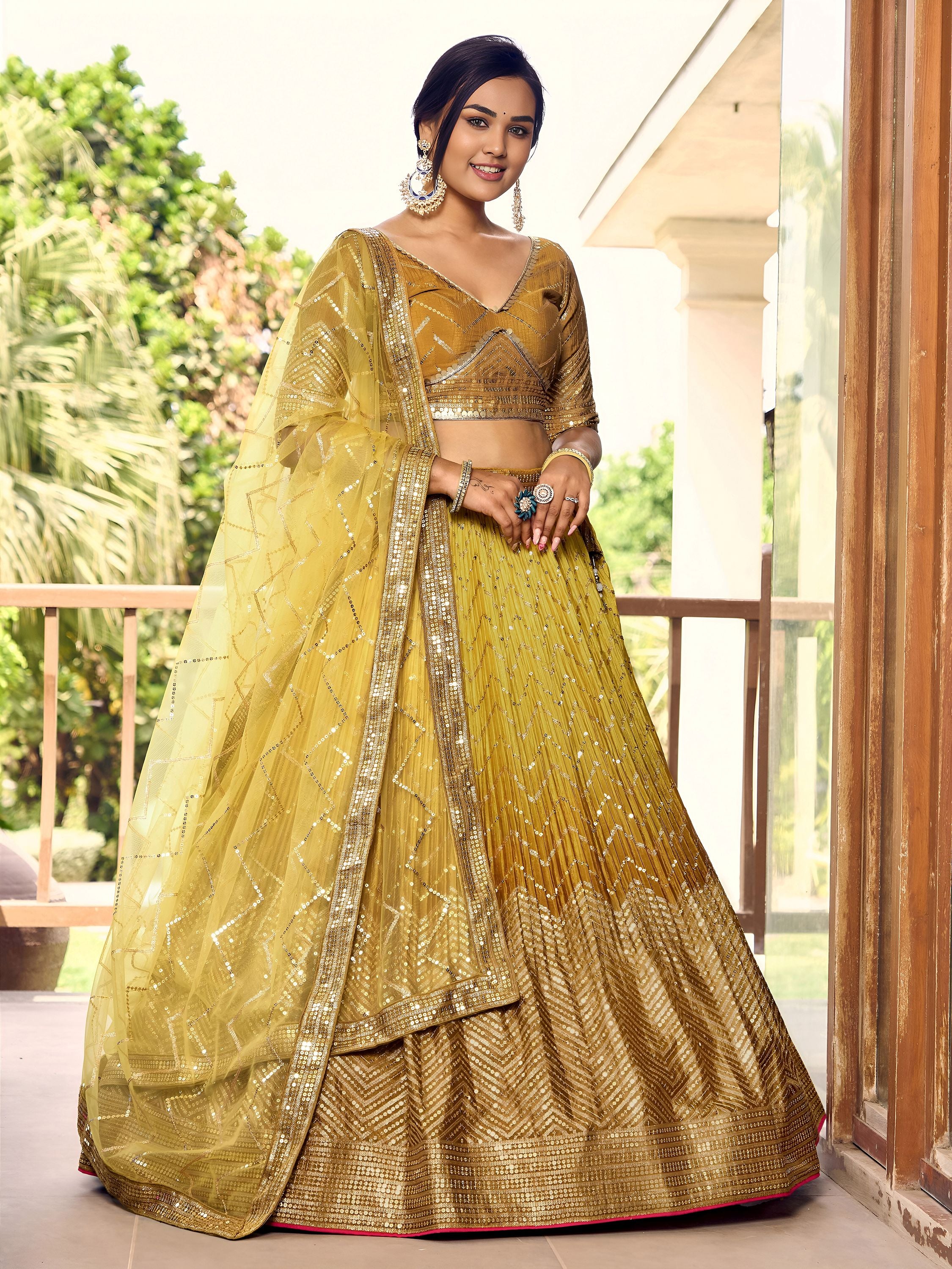 Outstanding Yellow Sequins Chinon Haldi Wear Lehenga Choli