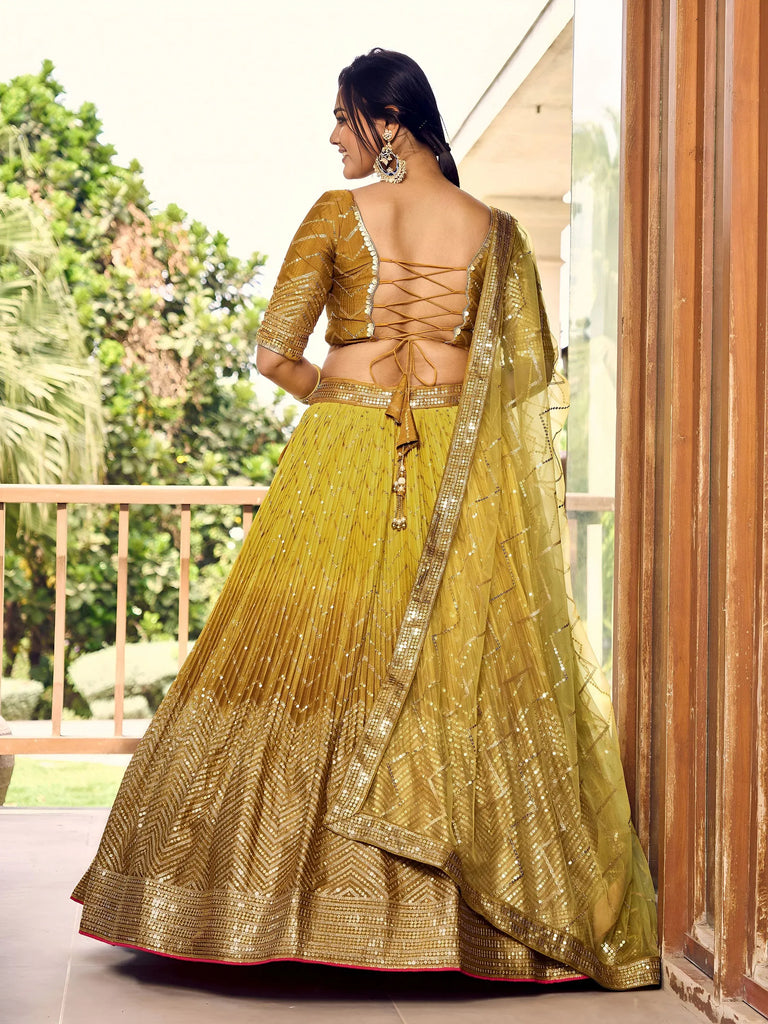 Outstanding Yellow Sequins Chinon Haldi Wear Lehenga Choli