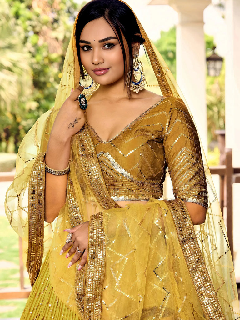 Outstanding Yellow Sequins Chinon Haldi Wear Lehenga Choli