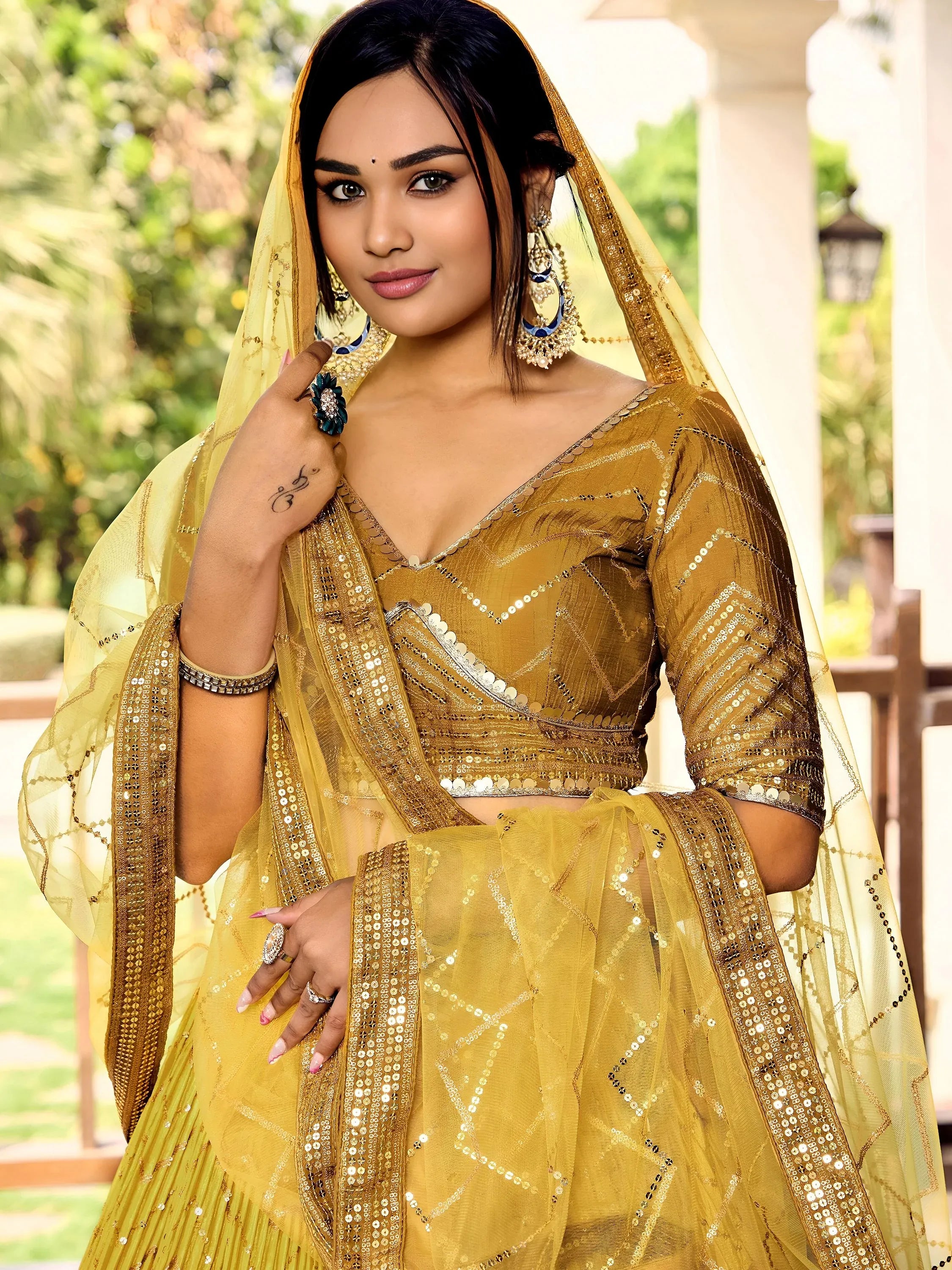 Outstanding Yellow Sequins Chinon Haldi Wear Lehenga Choli