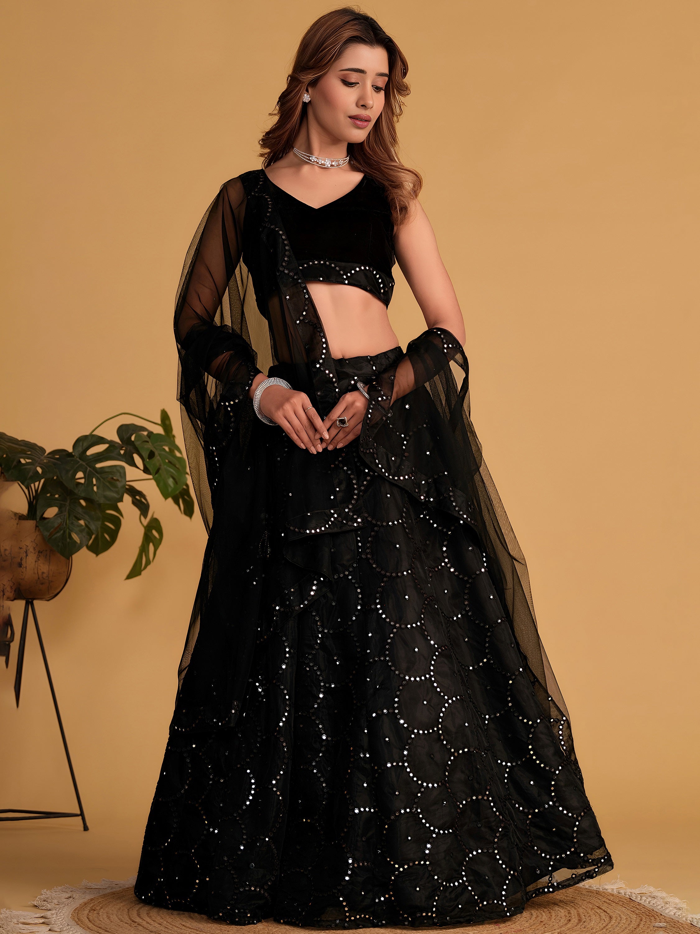 Mesmerizing Black Mirror Work Organza Reception Wear Lehenga Choli