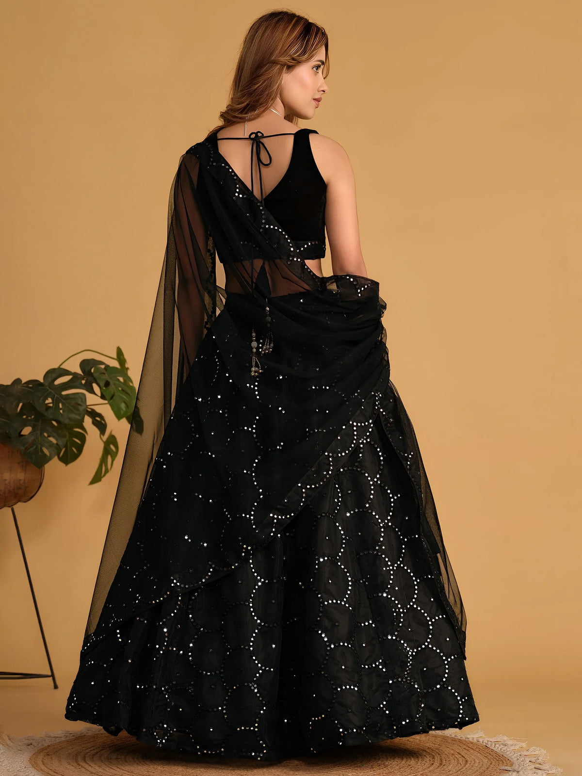 Mesmerizing Black Mirror Work Organza Reception Wear Lehenga Choli