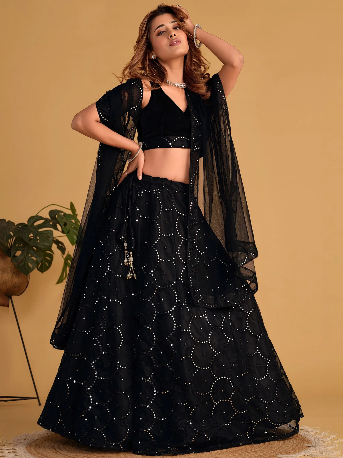 Mesmerizing Black Mirror Work Organza Reception Wear Lehenga Choli