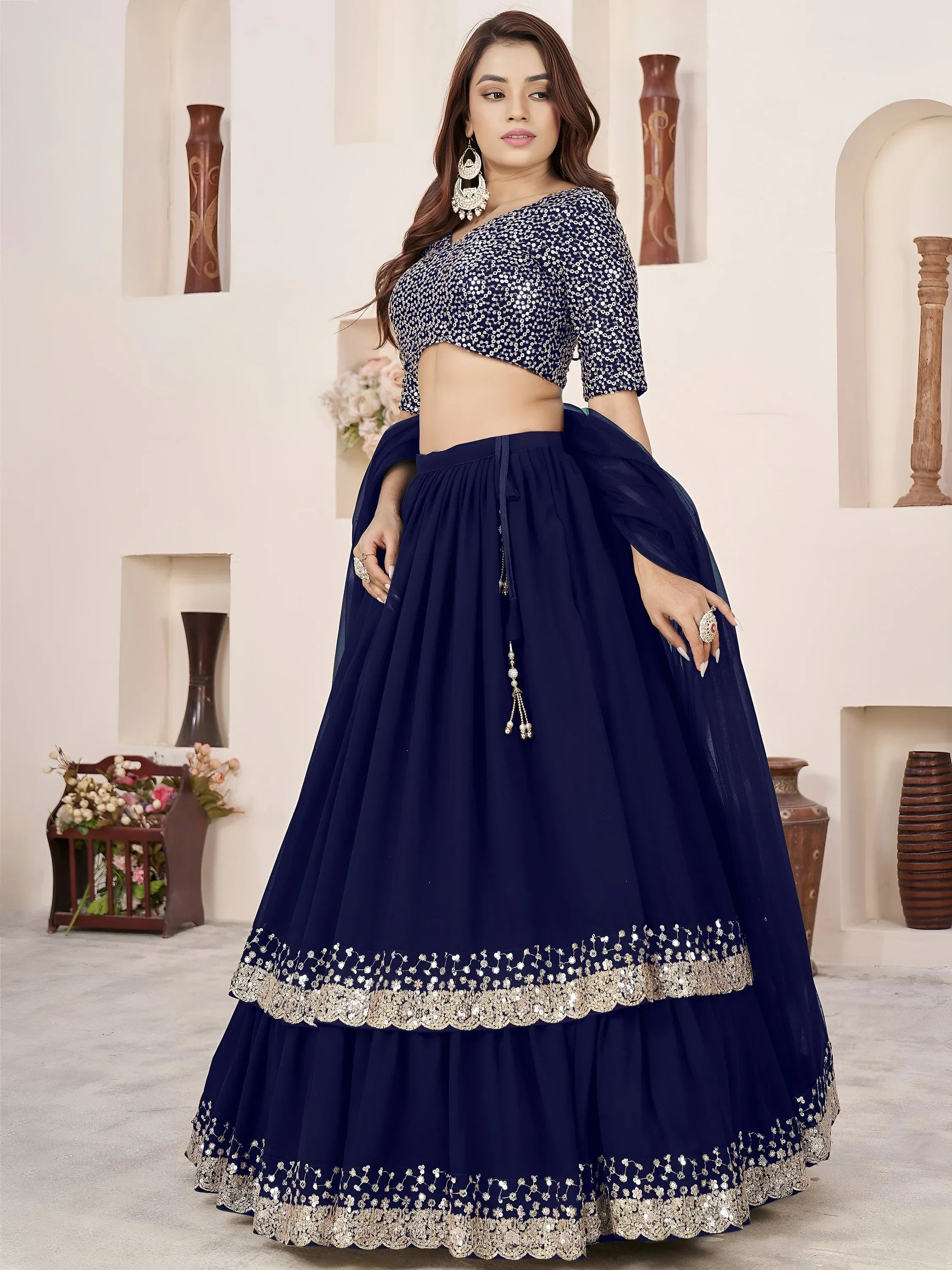 Enchanting Blue Sequins Georgette Function Wear Lehenga Choli