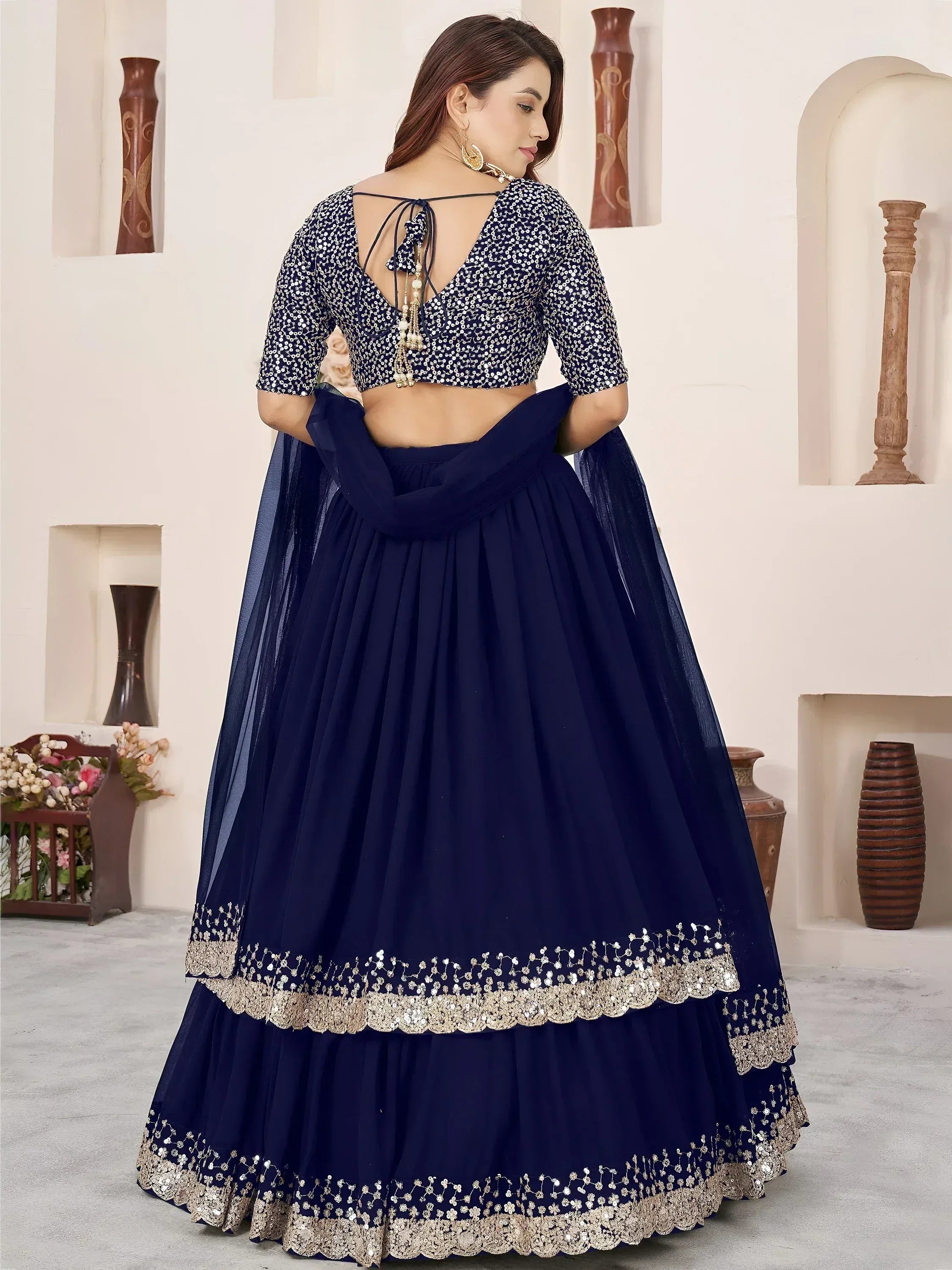 Enchanting Blue Sequins Georgette Function Wear Lehenga Choli