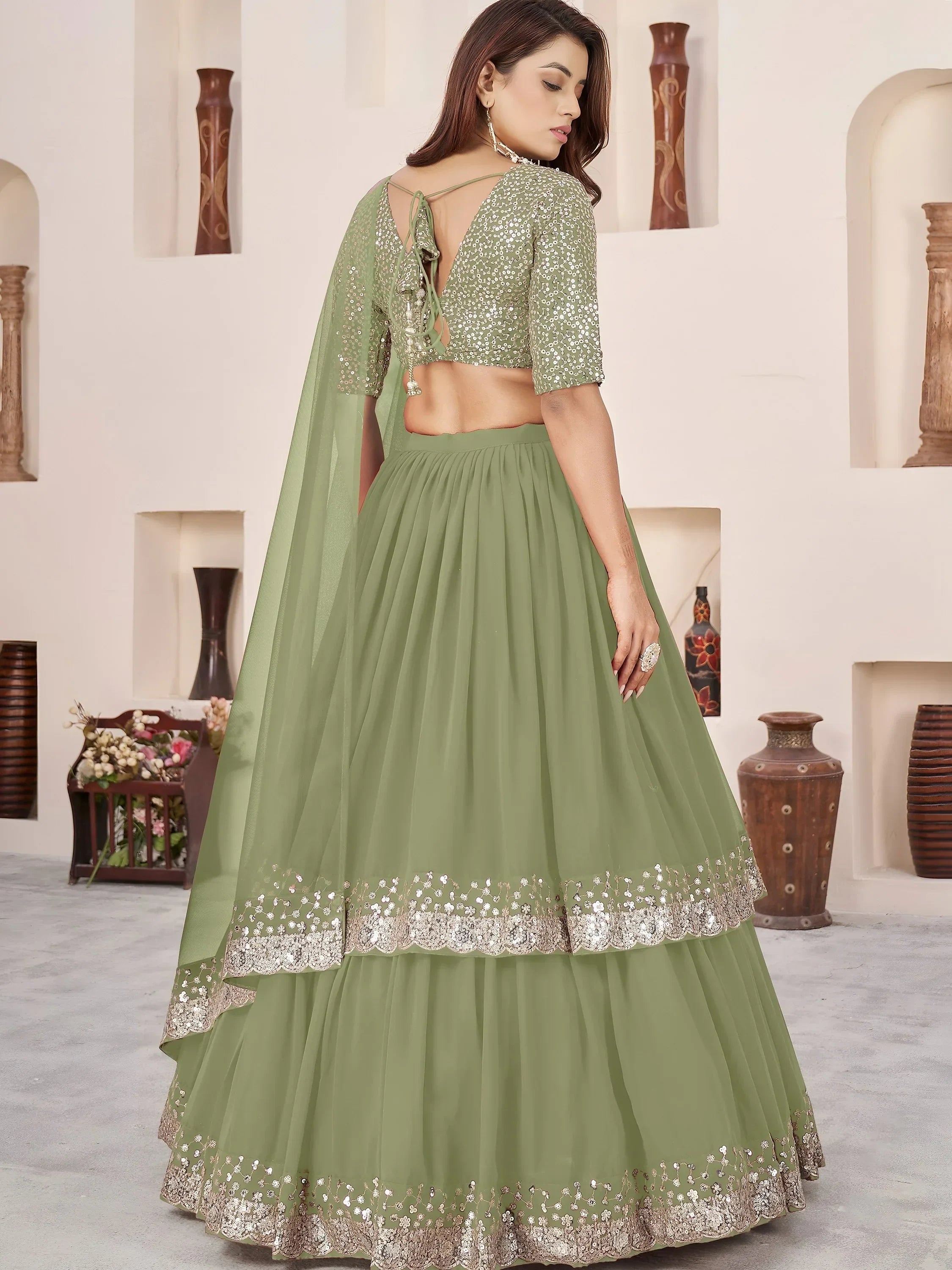 Amazing Olive Green Sequins Georgette Wedding Wear Lehenga Choli