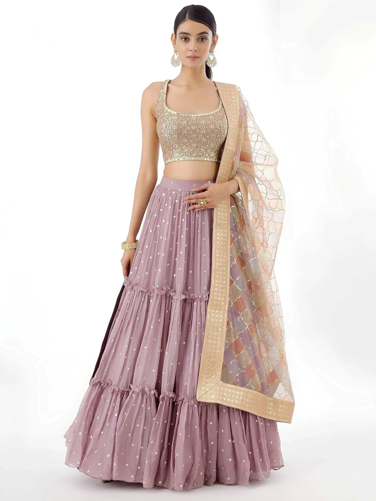 Dusty pink lehenga choli with gold sequin embroidery and sheer dupatta for Indian ethnic wear