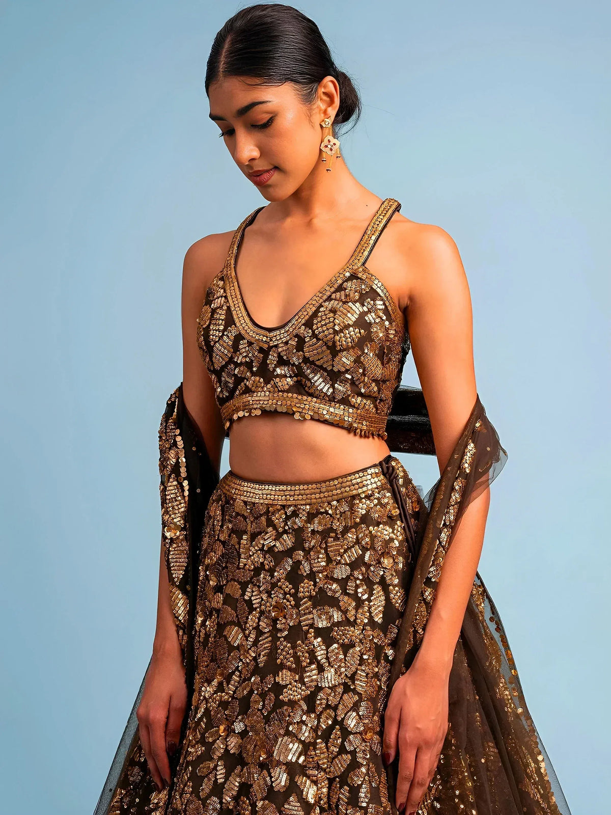 Black and gold sequin lehenga choli with sheer dupatta, Indian ethnic wear for weddings and parties