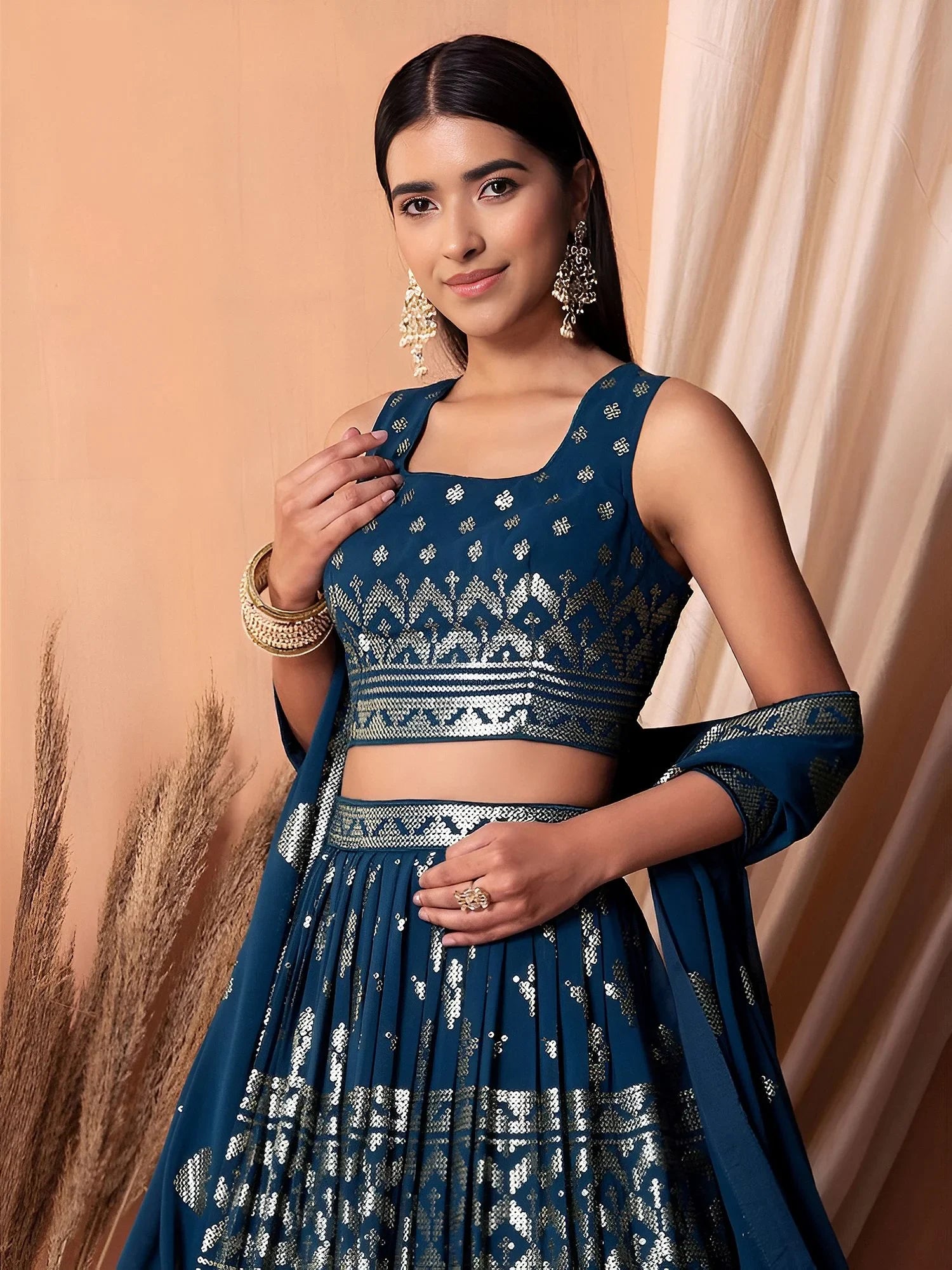 Dazzling Teal Blue Sequins Georgette Festival Wear Lehenga Choli