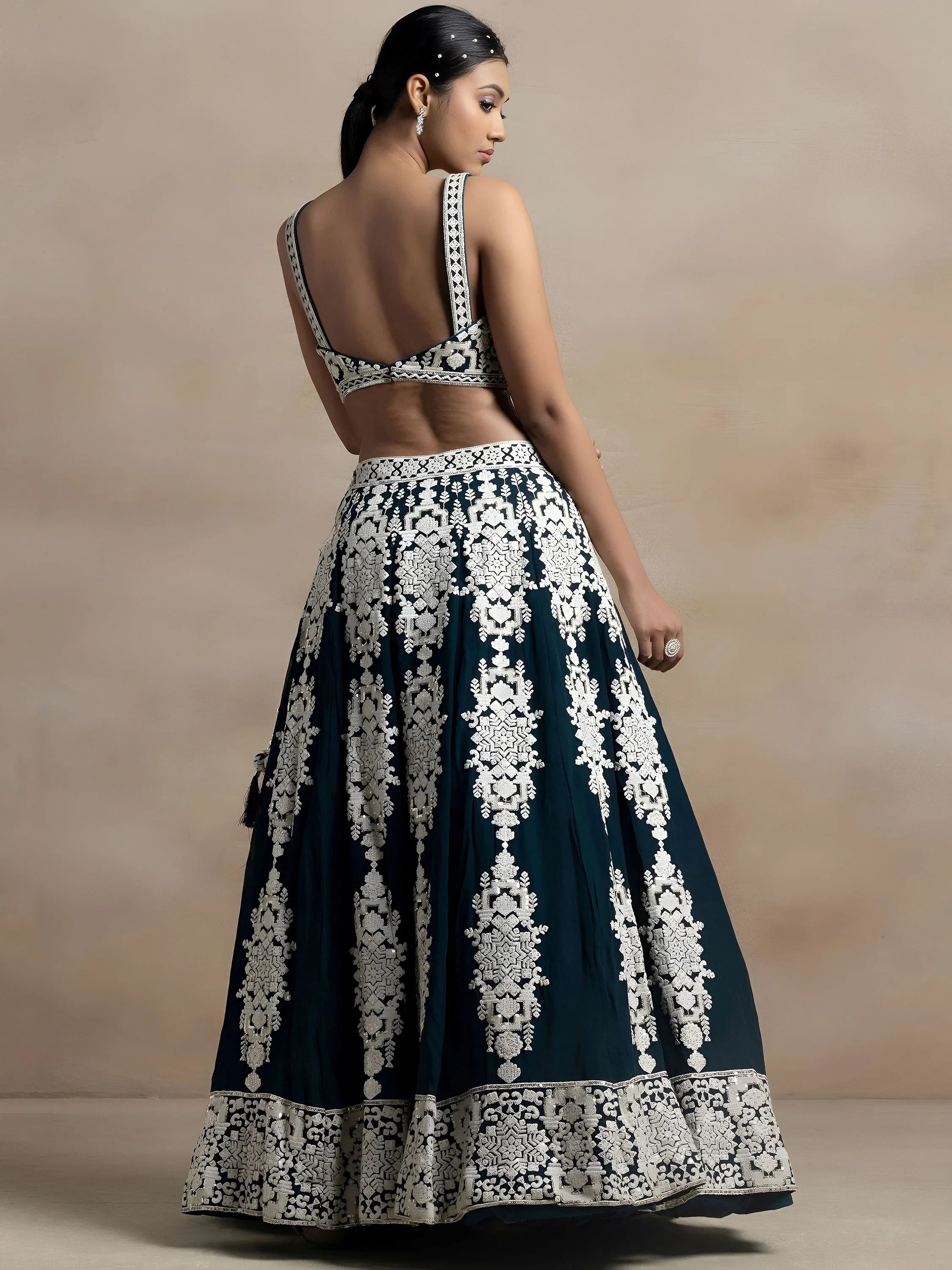 Glamorous Dark Green Thread Embroidered Georgette Lehenga Choli