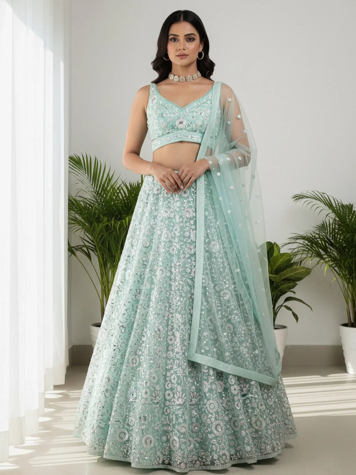 Sparkling Green Sequins Embroidered Net Reception Wear Lehenga Choli