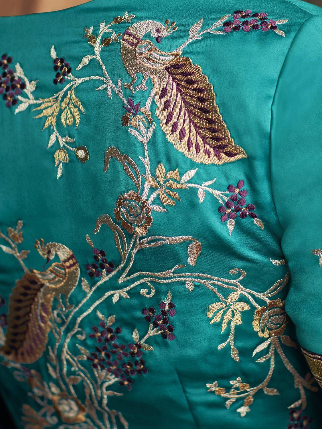 Teal ethnic gown with peacock and floral embroidery, designer Indian wear
