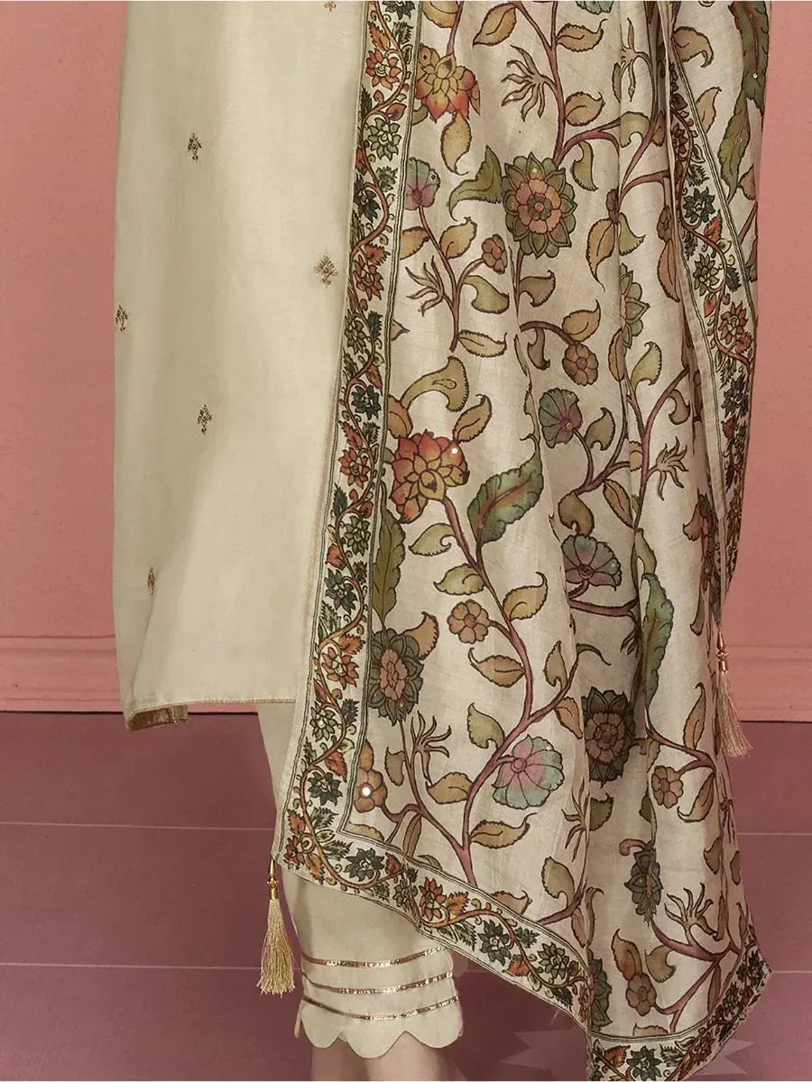Cream floral printed dupatta with tassels, paired with ethnic salwar kameez for traditional Indian wear