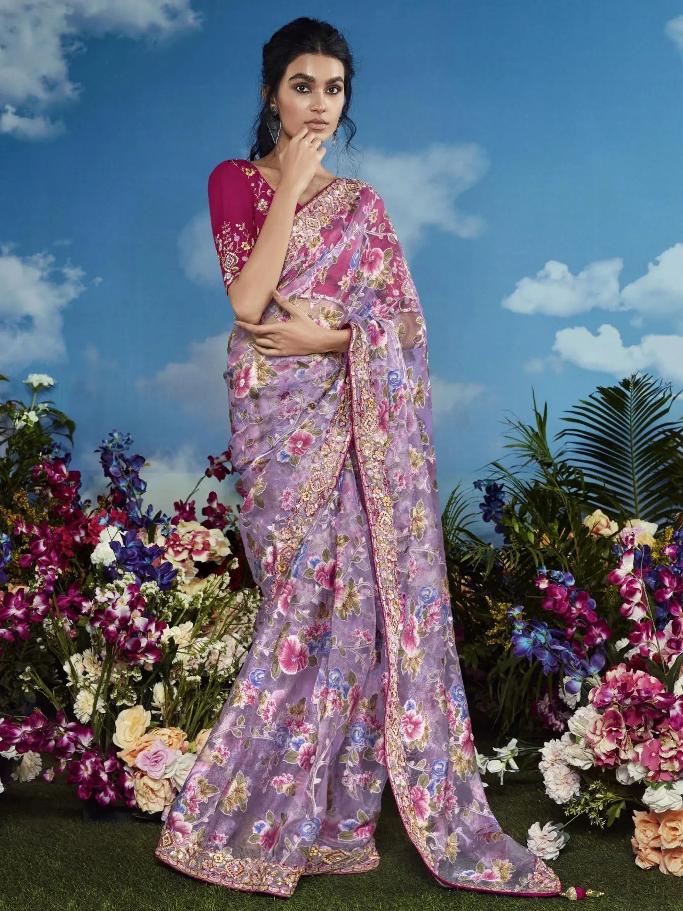 Purple floral embroidered saree with pink blouse, styled for Indian ethnic wear occasions