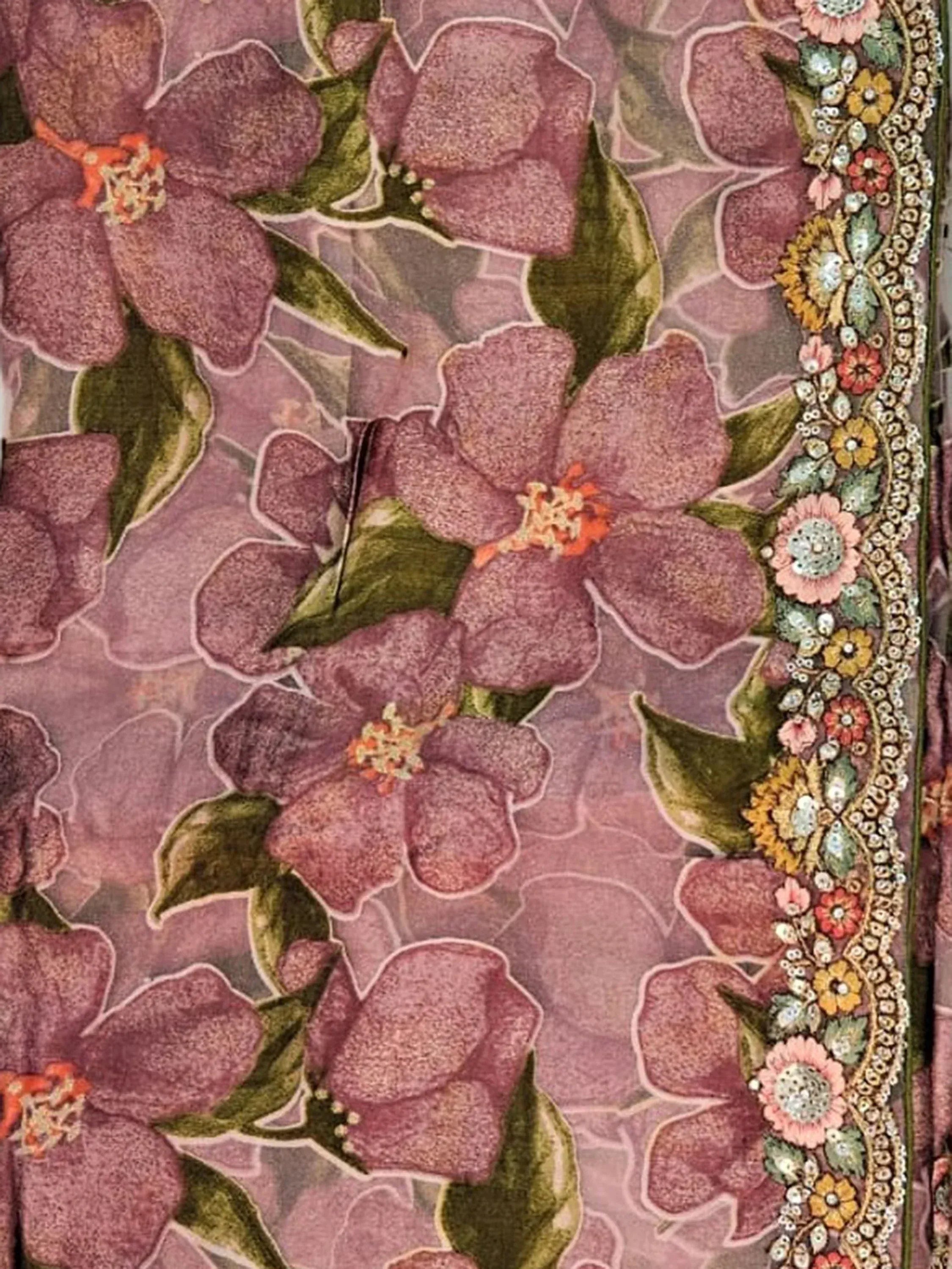 Pink floral print ethnic saree with intricate border detailing