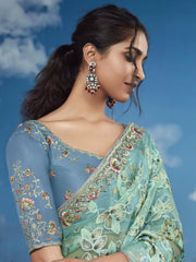 Breathtaking Sea Green Floral Brasso Wedding Wear Saree With Blouse