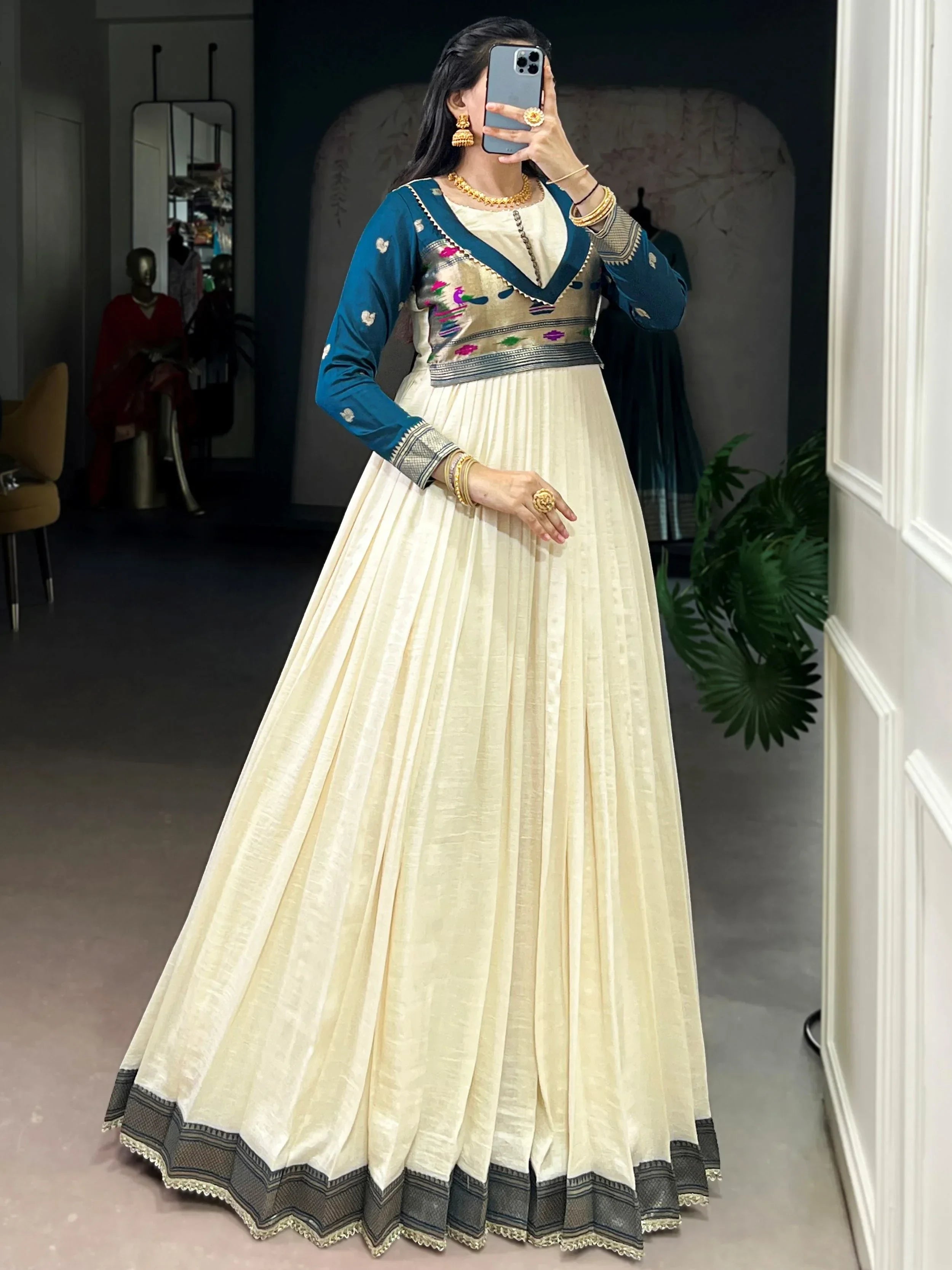 Graceful Off-White Zari Weaving Silk Festival Wear Gown