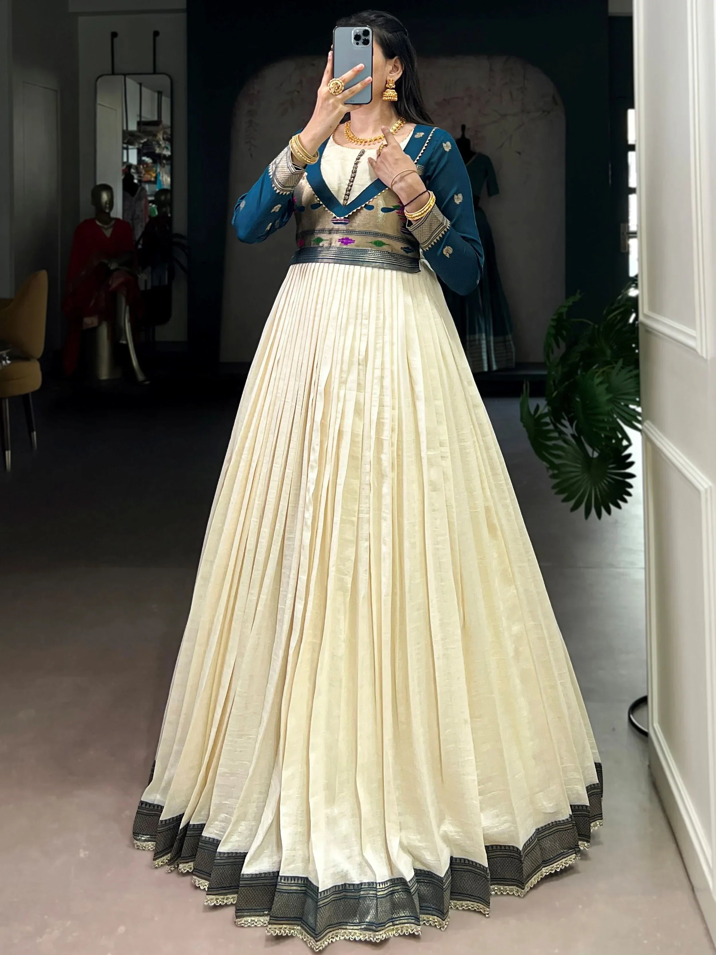 Graceful Off-White Zari Weaving Silk Festival Wear Gown